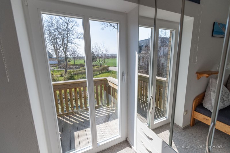 Balkontür mit Feldblick – Ferienwohnung 4 Personen Kappeln