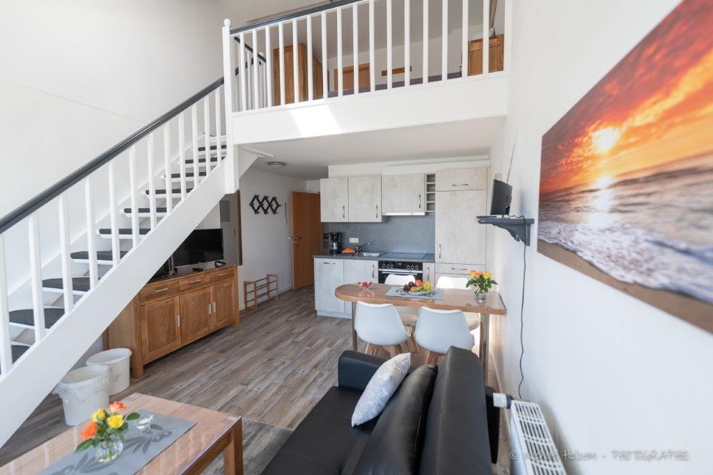 Offenes Wohnzimmer im Maisonette-Stil – Ferienwohnung Ferienhof Wick